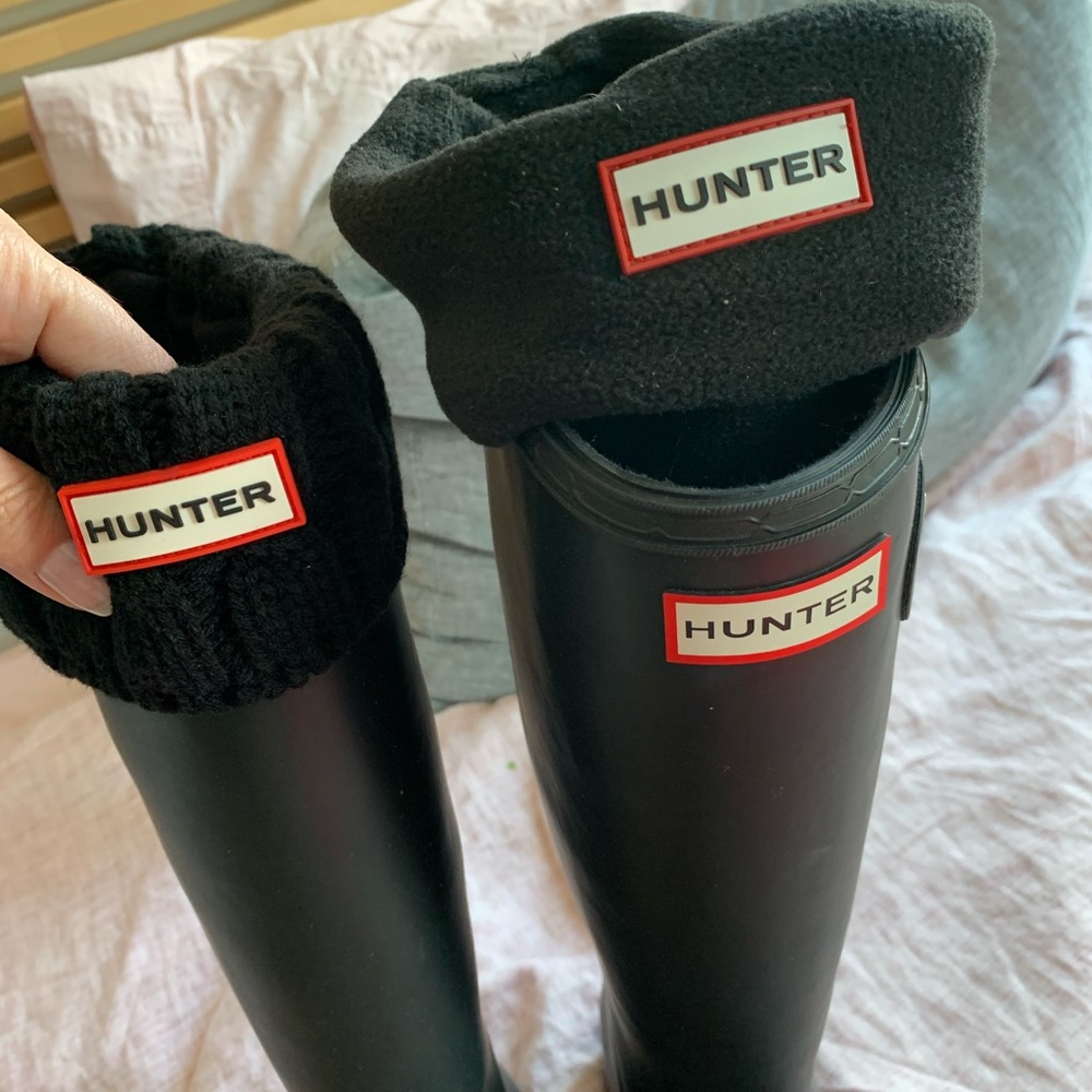 Hunter rain boots.